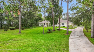 Fall in love with this picturesque Golf Course View heated pool on Citrus Hills Golf Club in Florida - for sale on GolfHomes.com, golf home, golf lot