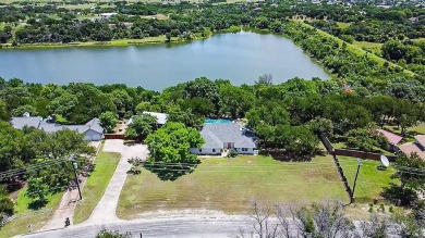 A one-of-a-kind, light-filled home with gorgeous grounds that on Squaw Creek Golf Club in Texas - for sale on GolfHomes.com, golf home, golf lot