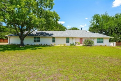A one-of-a-kind, light-filled home with gorgeous grounds that on Squaw Creek Golf Club in Texas - for sale on GolfHomes.com, golf home, golf lot