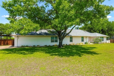 A one-of-a-kind, light-filled home with gorgeous grounds that on Squaw Creek Golf Club in Texas - for sale on GolfHomes.com, golf home, golf lot