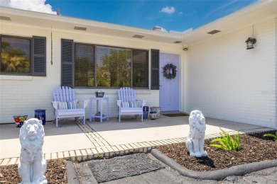 Just off palm-lined Bayshore Blvd, heading into the heart of on The Dunedin Country Club in Florida - for sale on GolfHomes.com, golf home, golf lot