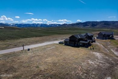 Discover your dream home site with this exceptional flat lot on Grand Elk Ranch and Club in Colorado - for sale on GolfHomes.com, golf home, golf lot