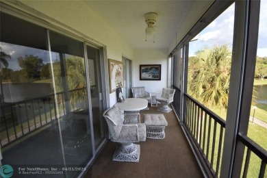 Discover convenience, and scenic beauty in this lovely 2-bedroom on Inverrary Country Club in Florida - for sale on GolfHomes.com, golf home, golf lot