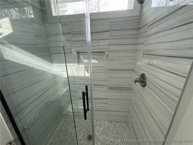 $15,000 seller credit being offer on this spacious and on Carolina Trace Country Club in North Carolina - for sale on GolfHomes.com, golf home, golf lot