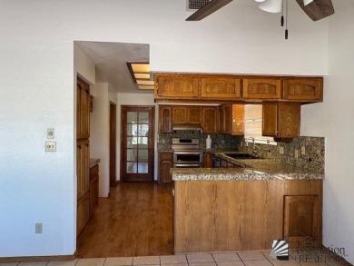 Move in ready 3-bedroom 1 full bath, 1 3/4 bath, back yard gate on Mesa Del Sol Golf Club in Arizona - for sale on GolfHomes.com, golf home, golf lot