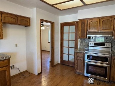 Move in ready 3-bedroom 1 full bath, 1 3/4 bath, back yard gate on Mesa Del Sol Golf Club in Arizona - for sale on GolfHomes.com, golf home, golf lot