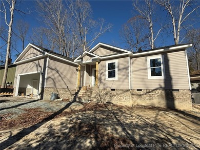 Beautifully designed single-story home offering 1,885 sq ft with on Carolina Trace Country Club in North Carolina - for sale on GolfHomes.com, golf home, golf lot