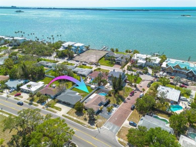Just off palm-lined Bayshore Blvd, heading into the heart of on The Dunedin Country Club in Florida - for sale on GolfHomes.com, golf home, golf lot