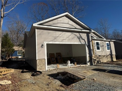 Beautifully designed single-story home offering 1,885 sq ft with on Carolina Trace Country Club in North Carolina - for sale on GolfHomes.com, golf home, golf lot
