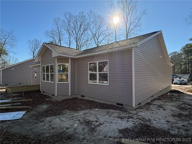 Beautifully designed single-story home offering 1,885 sq ft with on Carolina Trace Country Club in North Carolina - for sale on GolfHomes.com, golf home, golf lot