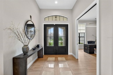 Discover a truly stunning Arthur Rutenberg home in the esteemed on Grasslands Golf and Country Club in Florida - for sale on GolfHomes.com, golf home, golf lot