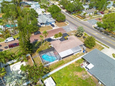 Just off palm-lined Bayshore Blvd, heading into the heart of on The Dunedin Country Club in Florida - for sale on GolfHomes.com, golf home, golf lot