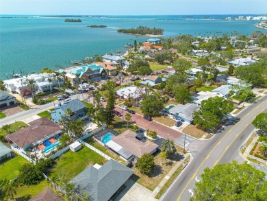 Just off palm-lined Bayshore Blvd, heading into the heart of on The Dunedin Country Club in Florida - for sale on GolfHomes.com, golf home, golf lot