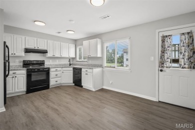 This lovely converted 2 bedroom, 2 bath condo has all you've on Lake Saint Louis Par 3 in Missouri - for sale on GolfHomes.com, golf home, golf lot
