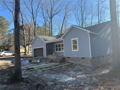 Enjoy easy living in this single-story, 1,754 sq ft on Carolina Trace Country Club in North Carolina - for sale on GolfHomes.com, golf home, golf lot