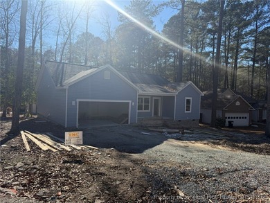 Enjoy easy living in this single-story, 1,754 sq ft on Carolina Trace Country Club in North Carolina - for sale on GolfHomes.com, golf home, golf lot
