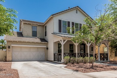 A beautifully crafted 4-bedroom, 2.5-bath Farmhouse-style home on Verrado Golf Club  in Arizona - for sale on GolfHomes.com, golf home, golf lot