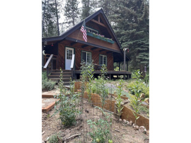 Cedar Cabin in the woods walking distance to Terrace Lakes Golf on Terrace Lakes Golf Resort in Idaho - for sale on GolfHomes.com, golf home, golf lot