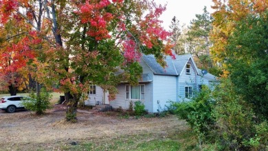 Discover a unique opportunity with this rural FIXER-UPPER on the on Sandstone Area Country Club in Minnesota - for sale on GolfHomes.com, golf home, golf lot