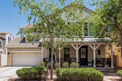 A beautifully crafted 4-bedroom, 2.5-bath Farmhouse-style home on Verrado Golf Club  in Arizona - for sale on GolfHomes.com, golf home, golf lot