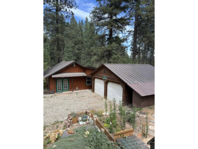Cedar Cabin in the woods walking distance to Terrace Lakes Golf on Terrace Lakes Golf Resort in Idaho - for sale on GolfHomes.com, golf home, golf lot