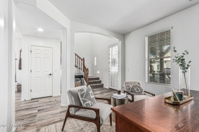 A beautifully crafted 4-bedroom, 2.5-bath Farmhouse-style home on Verrado Golf Club  in Arizona - for sale on GolfHomes.com, golf home, golf lot