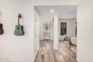A beautifully crafted 4-bedroom, 2.5-bath Farmhouse-style home on Verrado Golf Club  in Arizona - for sale on GolfHomes.com, golf home, golf lot