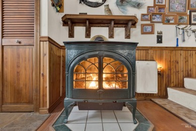 Cedar Cabin in the woods walking distance to Terrace Lakes Golf on Terrace Lakes Golf Resort in Idaho - for sale on GolfHomes.com, golf home, golf lot