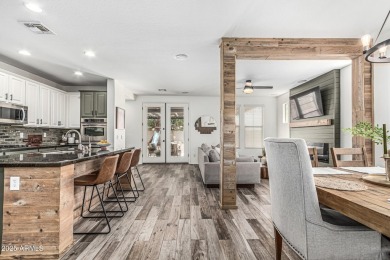 A beautifully crafted 4-bedroom, 2.5-bath Farmhouse-style home on Verrado Golf Club  in Arizona - for sale on GolfHomes.com, golf home, golf lot