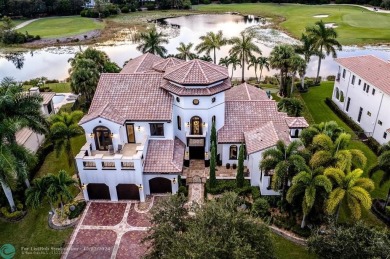 Magnificent custom home in PGCC. This mini mansion offers 6 on Parkland Golf Club in Florida - for sale on GolfHomes.com, golf home, golf lot