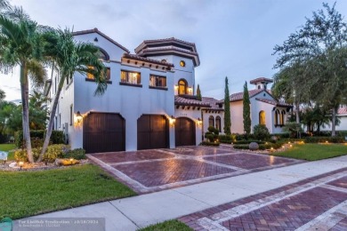 Magnificent custom home in PGCC. This mini mansion offers 6 on Parkland Golf Club in Florida - for sale on GolfHomes.com, golf home, golf lot