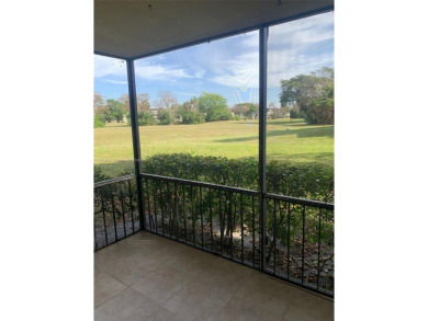 Nestled in a serene enclave a spacious ground floor1/1  living on Inverrary Country Club in Florida - for sale on GolfHomes.com, golf home, golf lot