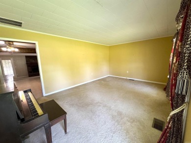 937 Homecrest Drive in Piggott, AR is a 3 BR, 2 BA, 1,742 SF on Sugar Creek Country Club in Arkansas - for sale on GolfHomes.com, golf home, golf lot