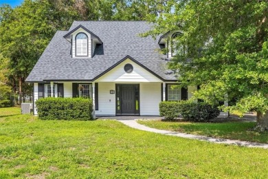 Discover serene golf course living in this beautiful home on Laurel Island Links in Georgia - for sale on GolfHomes.com, golf home, golf lot
