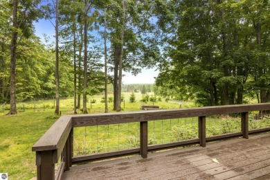 Enjoy a peaceful, wooded retreat. This charming property offers on Black Forest At Wilderness Valley in Michigan - for sale on GolfHomes.com, golf home, golf lot