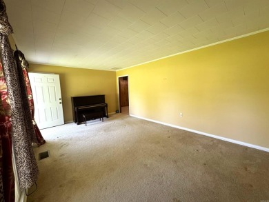 937 Homecrest Drive in Piggott, AR is a 3 BR, 2 BA, 1,742 SF on Sugar Creek Country Club in Arkansas - for sale on GolfHomes.com, golf home, golf lot