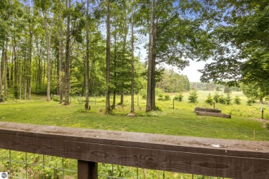 Enjoy a peaceful, wooded retreat. This charming property offers on Black Forest At Wilderness Valley in Michigan - for sale on GolfHomes.com, golf home, golf lot