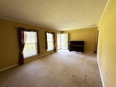 937 Homecrest Drive in Piggott, AR is a 3 BR, 2 BA, 1,742 SF on Sugar Creek Country Club in Arkansas - for sale on GolfHomes.com, golf home, golf lot