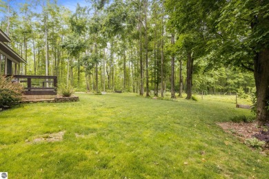 Enjoy a peaceful, wooded retreat. This charming property offers on Black Forest At Wilderness Valley in Michigan - for sale on GolfHomes.com, golf home, golf lot