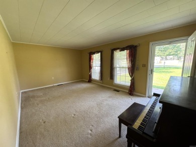 937 Homecrest Drive in Piggott, AR is a 3 BR, 2 BA, 1,742 SF on Sugar Creek Country Club in Arkansas - for sale on GolfHomes.com, golf home, golf lot