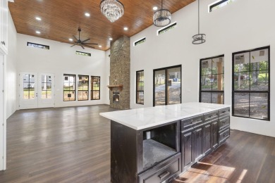 On Fleek. Bussin'. IYKYK.Welcome to a truly exceptional modern on Kimberling City Golf Club in Missouri - for sale on GolfHomes.com, golf home, golf lot