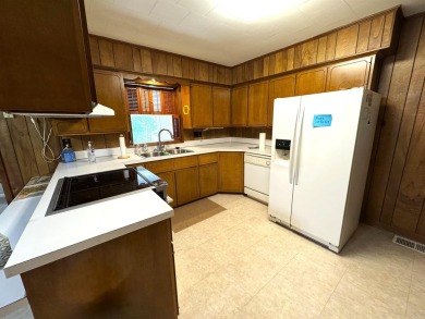 937 Homecrest Drive in Piggott, AR is a 3 BR, 2 BA, 1,742 SF on Sugar Creek Country Club in Arkansas - for sale on GolfHomes.com, golf home, golf lot
