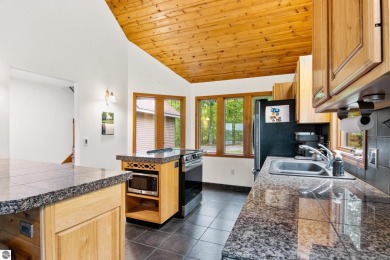 Enjoy a peaceful, wooded retreat. This charming property offers on Black Forest At Wilderness Valley in Michigan - for sale on GolfHomes.com, golf home, golf lot