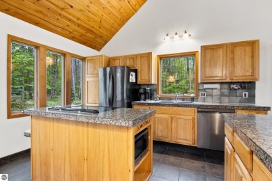 Enjoy a peaceful, wooded retreat. This charming property offers on Black Forest At Wilderness Valley in Michigan - for sale on GolfHomes.com, golf home, golf lot