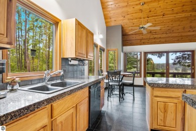 Enjoy a peaceful, wooded retreat. This charming property offers on Black Forest At Wilderness Valley in Michigan - for sale on GolfHomes.com, golf home, golf lot