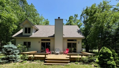 Michaywe chalet on Northstar Rd., one of Michaywe's most on Michaywe Pines Course in Michigan - for sale on GolfHomes.com, golf home, golf lot