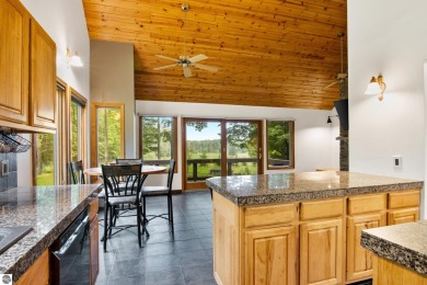 Enjoy a peaceful, wooded retreat. This charming property offers on Black Forest At Wilderness Valley in Michigan - for sale on GolfHomes.com, golf home, golf lot