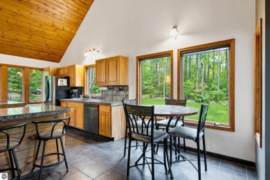 Enjoy a peaceful, wooded retreat. This charming property offers on Black Forest At Wilderness Valley in Michigan - for sale on GolfHomes.com, golf home, golf lot