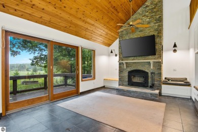 Enjoy a peaceful, wooded retreat. This charming property offers on Black Forest At Wilderness Valley in Michigan - for sale on GolfHomes.com, golf home, golf lot