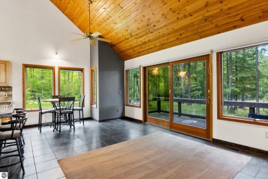 Enjoy a peaceful, wooded retreat. This charming property offers on Black Forest At Wilderness Valley in Michigan - for sale on GolfHomes.com, golf home, golf lot